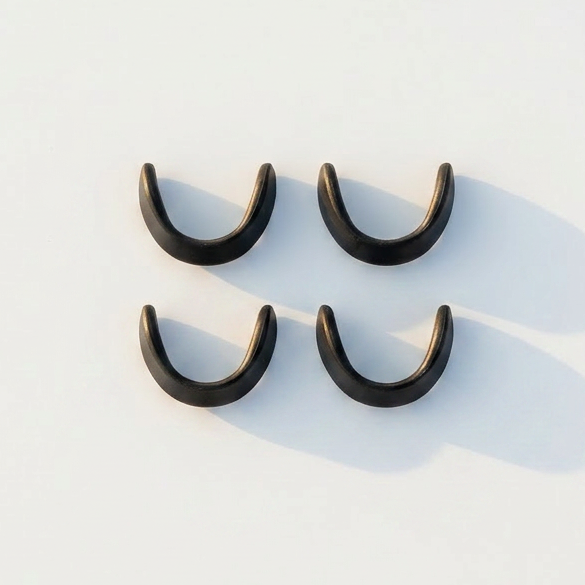 Close-up of AirSnap magnetic nasal strip showing slim magnetic pad design